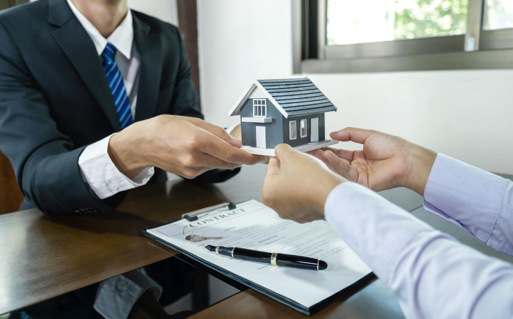 Homeowners association board members participating in HOA board training and education session with legal counsel.