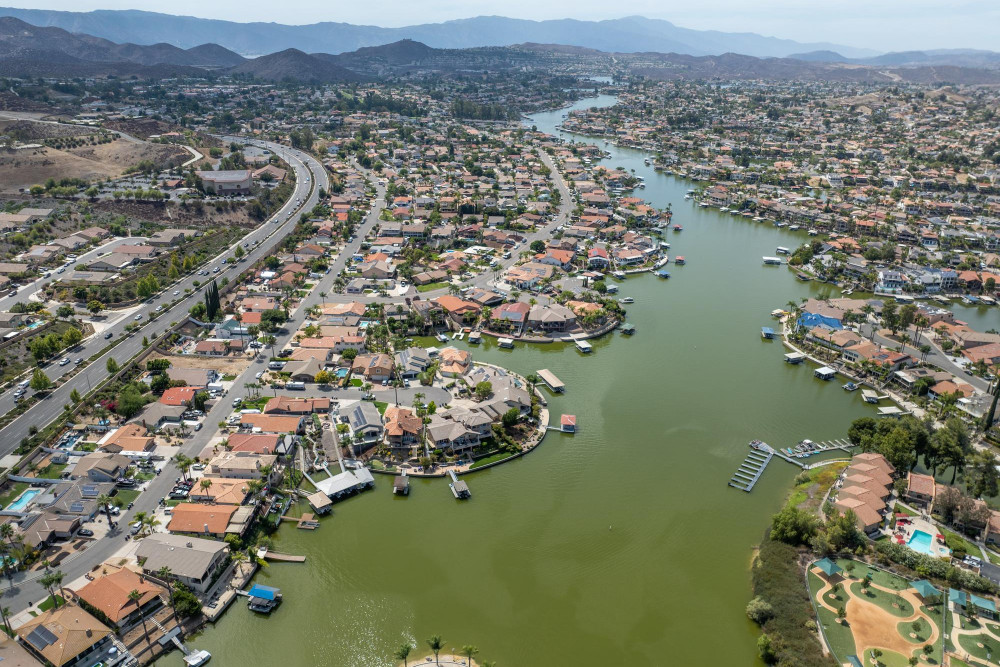 Aerial view of lake elsinore with sprawling neighborhood of family homes riverside county