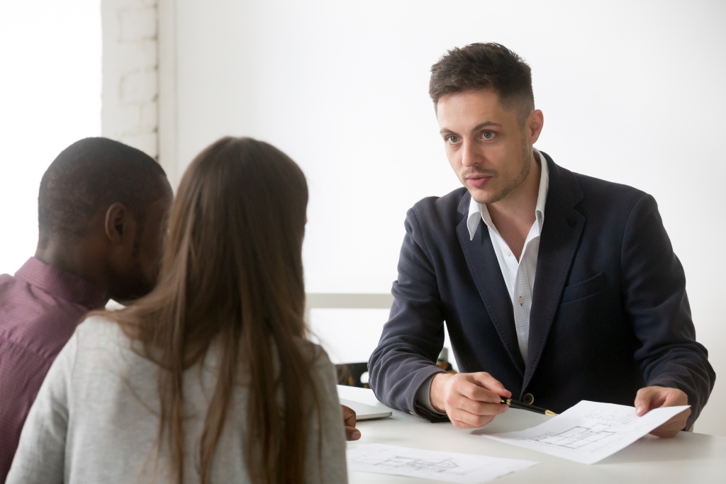 HOA attorney advising a homeowner during a board harassment dispute.