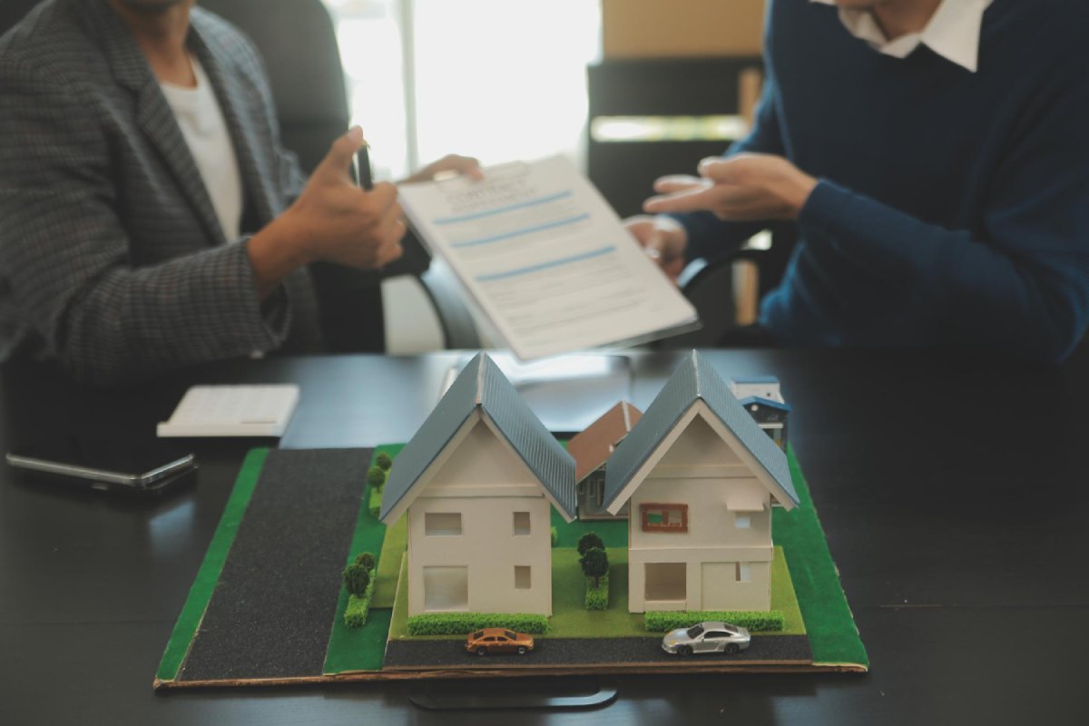 nevada-hoa-foreclosure-super-priority-lien Nevada HOA foreclosure notice and NRS 116 super-priority lien paperwork on a homeowner's kitchen table