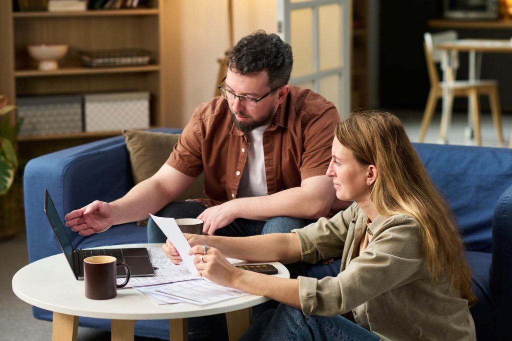 Homeowner reviewing HOA financial records and special assessment documents