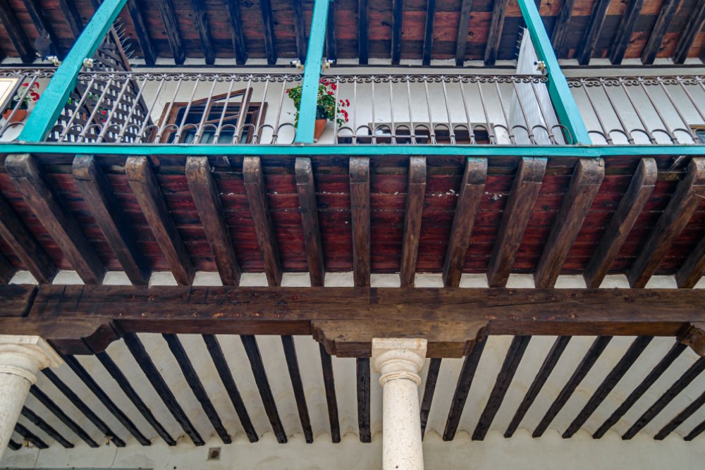 SB 326 balcony inspection of an elevated wood-framed balcony at a California condominium