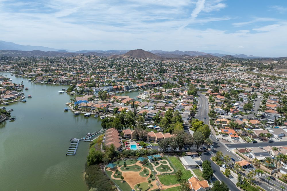 Aerial view of Lake Elsinore and surrounding residential neighborhoods in Riverside County