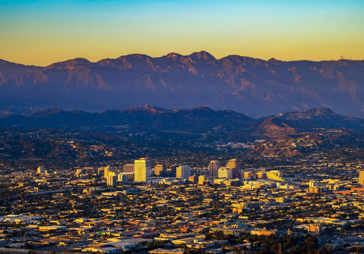 Sunset above downtown glendale and san gabriel mountains in california