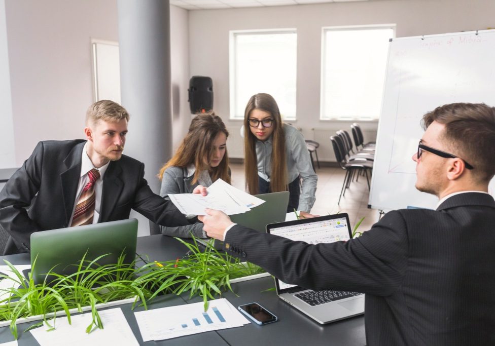 Hiring employees for an HOA with board members reviewing employment policies and legal requirements