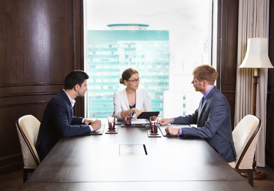 Homeowners attending an open HOA board meeting, illustrating HOA board meeting rules