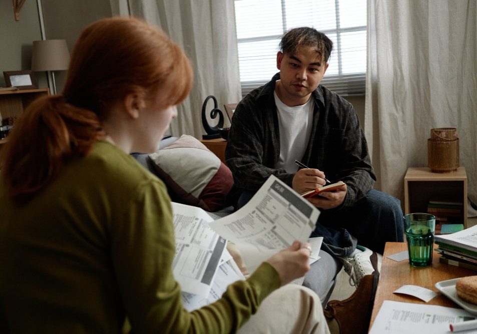 Homeowner reading an HOA violation notice, an example of HOA selective enforcement when neighbors are not cited