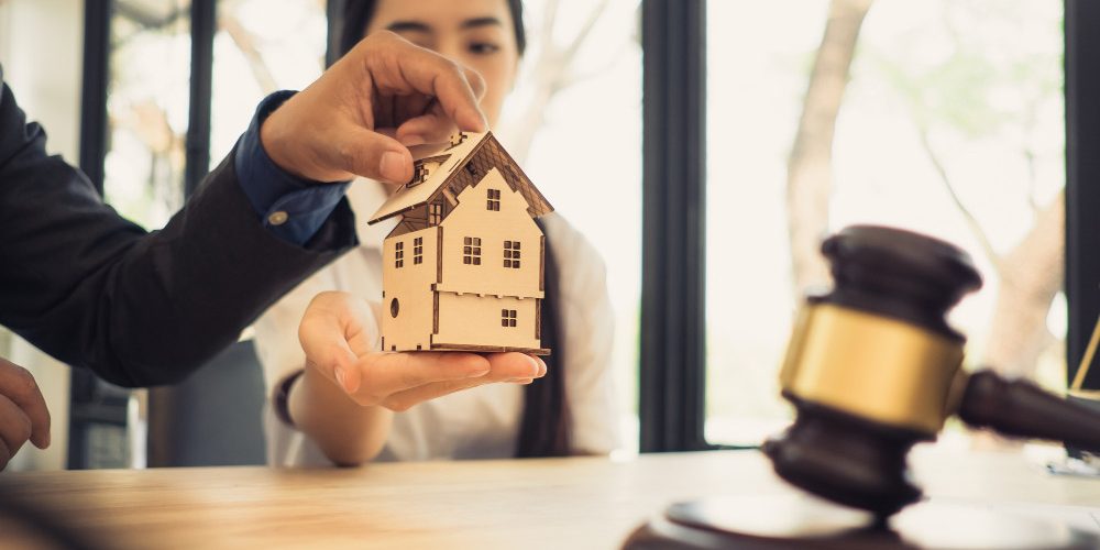 hoa-violation-notice-homeowner Homeowner reviewing HOA violation notice and fines in Nevada and California