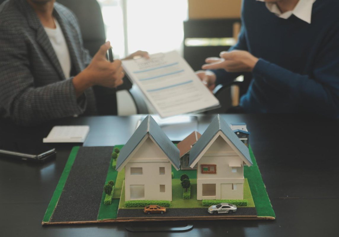 Nevada HOA foreclosure notice and NRS 116 super-priority lien paperwork on a homeowner's kitchen table